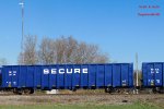 One of 17 new GE Rail Services gondolas rolling north